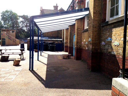 A Coniston Wall Mounted Canopy installed at Chase Side Primary School Enfield, Middlesex